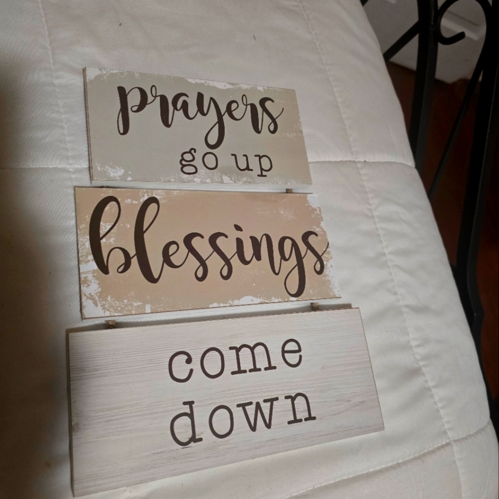 Prayers go up hanging sign